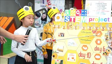 Students learn about the world of honeybees at the Aga Khan School, Osh 